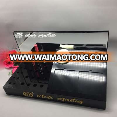 Custom black acrylic cosmetic counter display